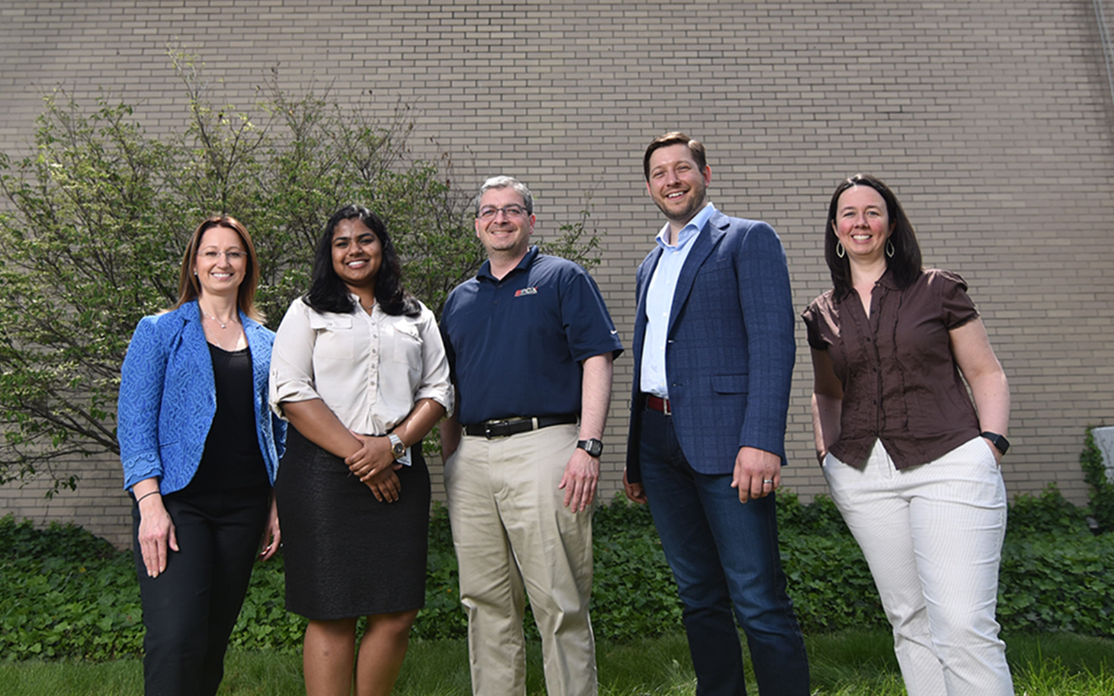 Left to right, professor Anna Radziwillowicz, MSBAPM student Chitra Reddy, PCX general manager and COO Aris Fotos, MBA Student Don Pendagast, and professor Jennifer Eigos